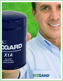 a man showing an ecogard conventional oil filter