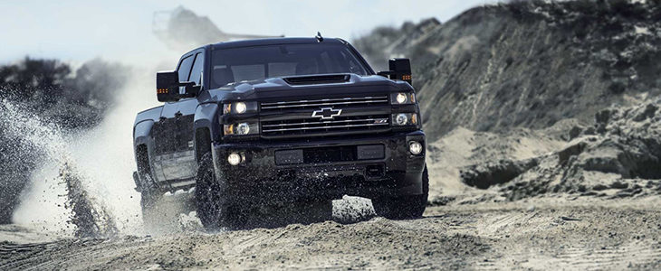 chevy silverado turbo diesel drifting on a mountain surface