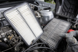 a new air filter with a dirty one while air filter replacement